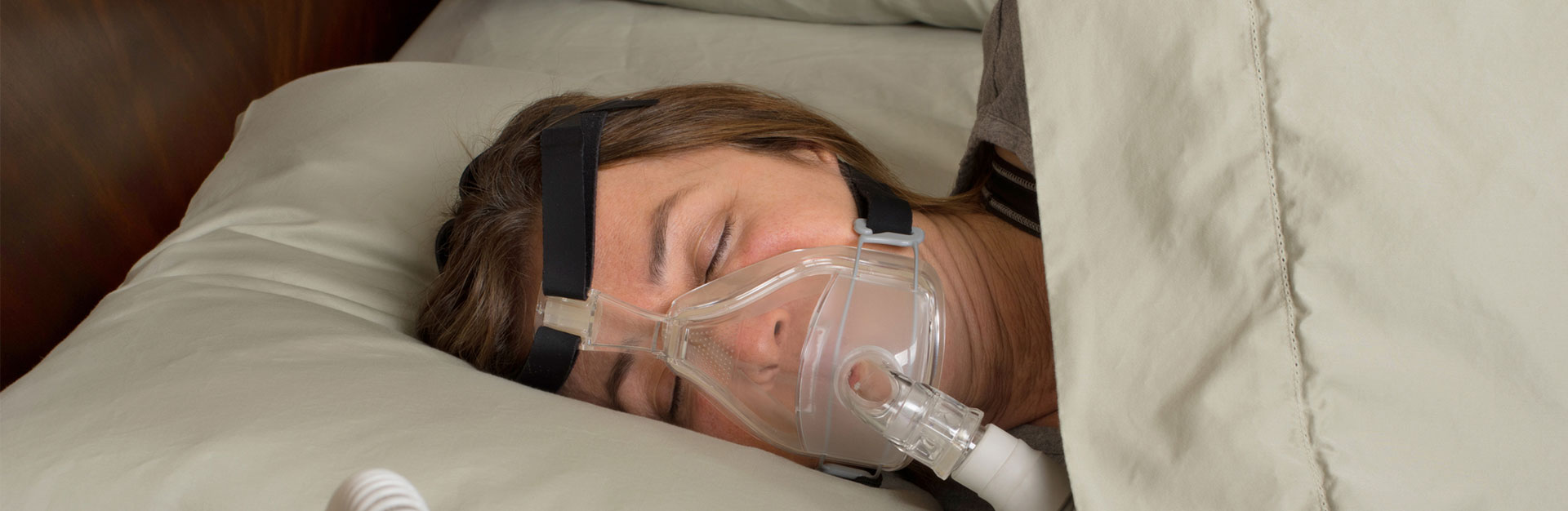 A woman is having sleep apnea treatment